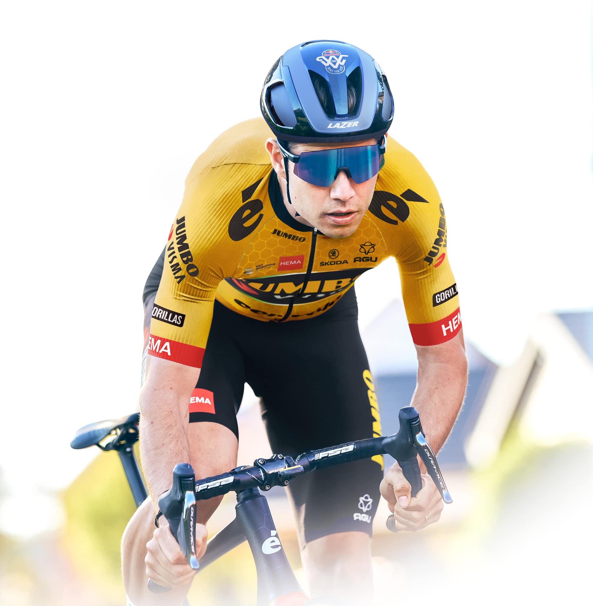 A cyclist in a yellow jersey and Lazer helmet, showcasing dynamic movement, ideal for Lazer content strategy & creation. - Alexi Hall
