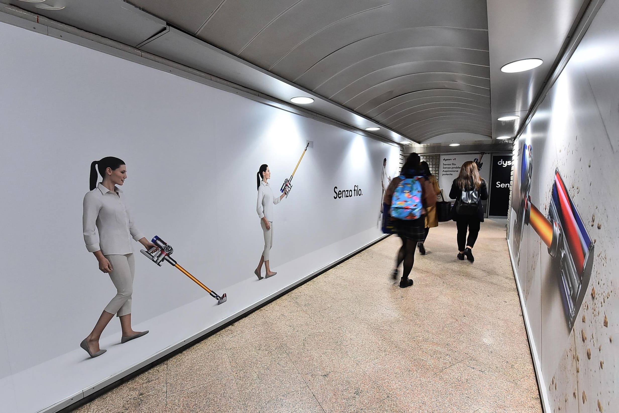 Dyson V8 Out-of-Home Advertising Campaign showcasing a sleek design in a busy urban setting. - Alexi Hall